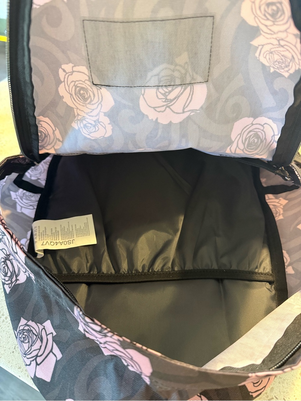 JanSport Trans Black Backpack with Violet Rose Print - Picture 3 of 3